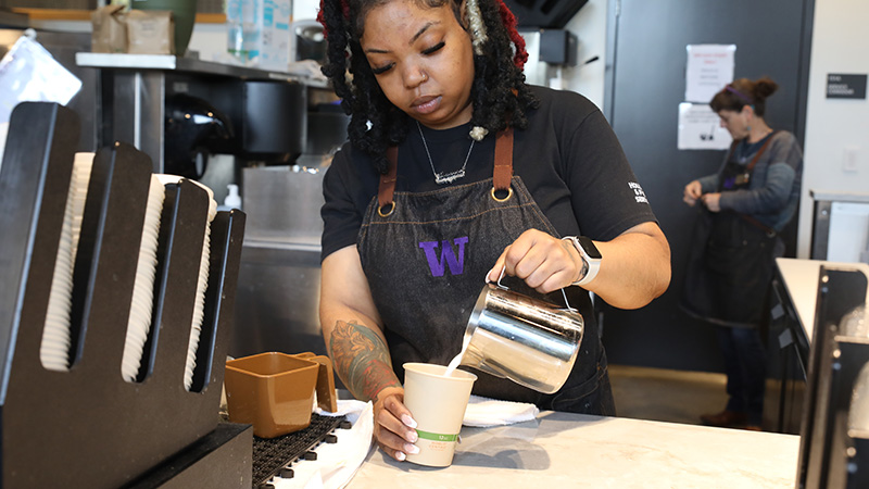Barista making coffee