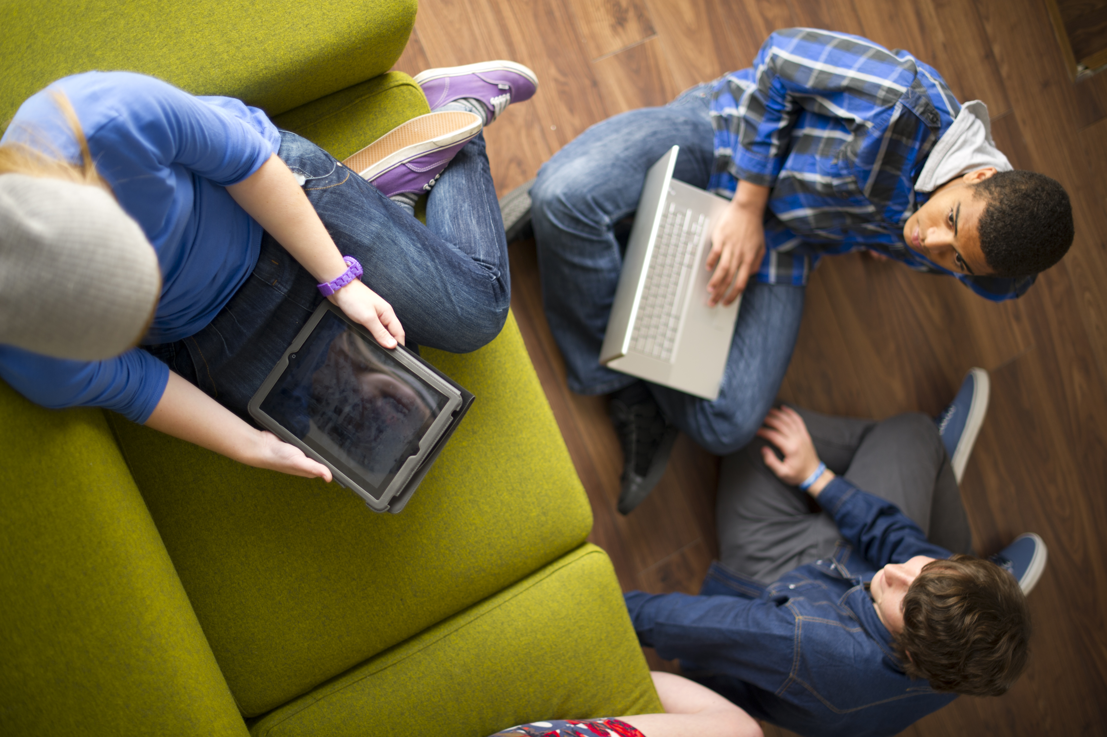 students work on a laptop