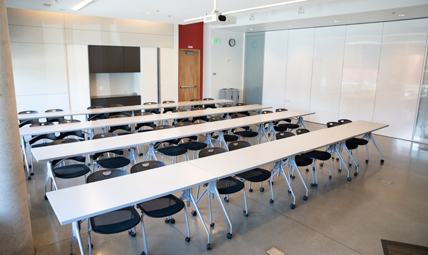 A room with desks and chairs.