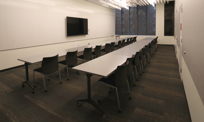 A room with desks and chairs.