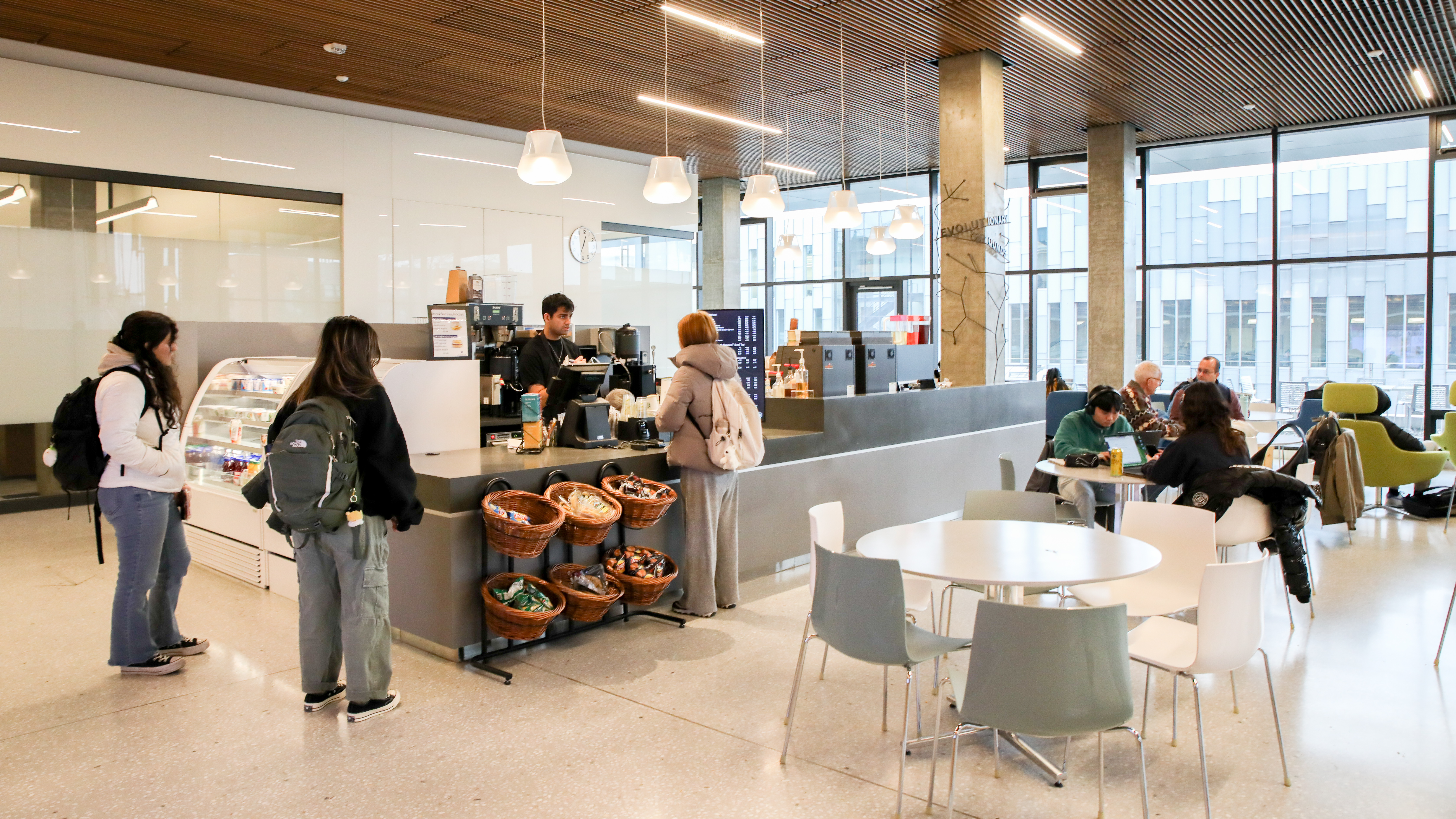 Students wait in line at cafe