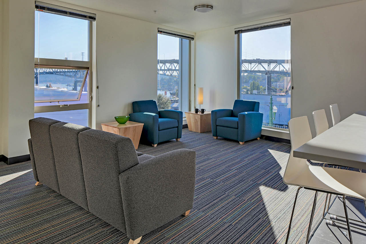 Common room with couches and chairs.