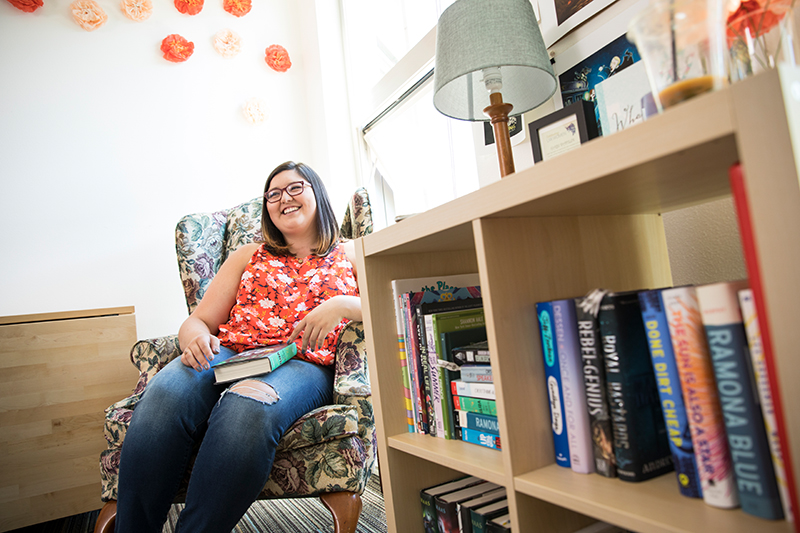 Graduate student relaxing in their apartment