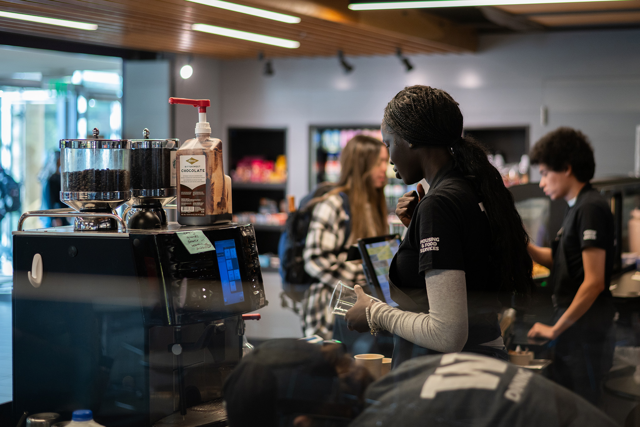 Students in line at Husky Den Cafe Espresso and Coffee Bar